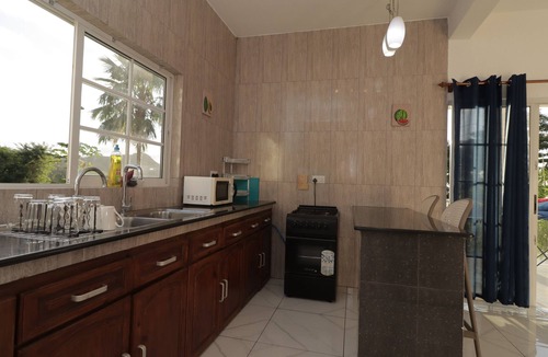 Anse Royale Apartment | Creole Cottage 2BR Apartment is a fully furnished located in Anse Royal with AC