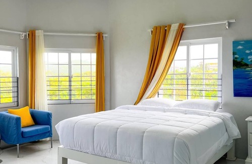Port Antonio Hotel | Luxury Havens in the hills of Passley Gardens overlooking Port Antonio town.