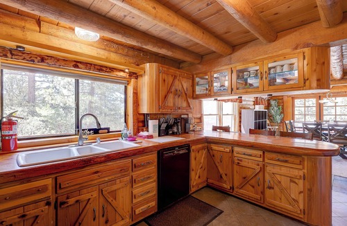 Fern Valley Cabin | Stay in this unique Mountain Retreat "Cougar Lodge", nestled in the shadow of color-soaked San Jacinto mountains. Our cabin is just a short drive to town center. Spacious 5-bedroom log cabin with two living rooms and a huge game area with Pool Table,