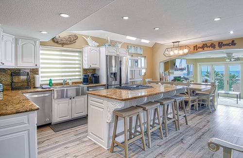 West Newport House | Three stories of WOW await you! This spectacular private home is one of a kind!