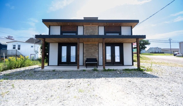 Charming Dockside Escape: Life by the Ocean in Cheticamp