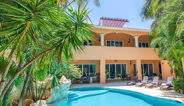Contemporary elegance at it's finest in this 5 bedroom luxury villa! in Puerto Aventuras