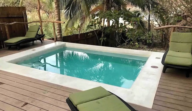 Great room with deck pool in front of perfect bay in Arroyo Cruz