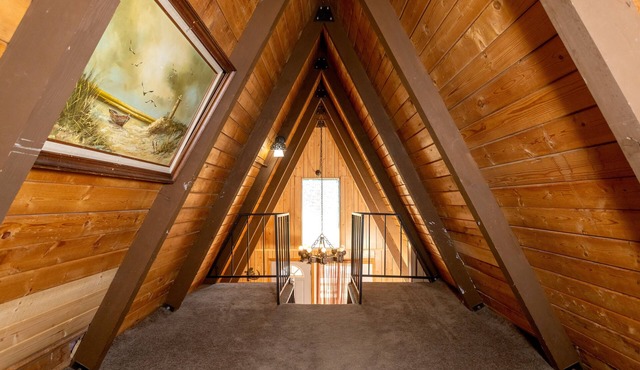Knotty Pine Chalet has a huge front deck and fully fenced yard . in Big Bear