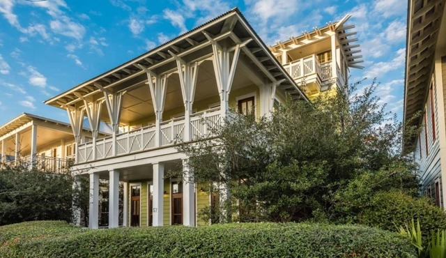 Located right on 30A, '57 Western Lake Drive' is a 6BR/6.5BA Home + Carriage House in Santa Rosa Beach