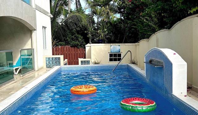 Marvelous 3-bedroom Apartment in Villa, Beautiful Pool, Steps from Surf & Ocean in Atlantic Shores