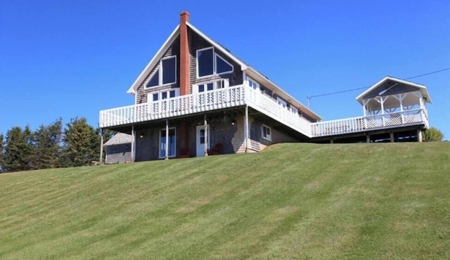 Oceanfront PEI Home with Ocean Views, Wraparound Deck & Private Beach in Coleman