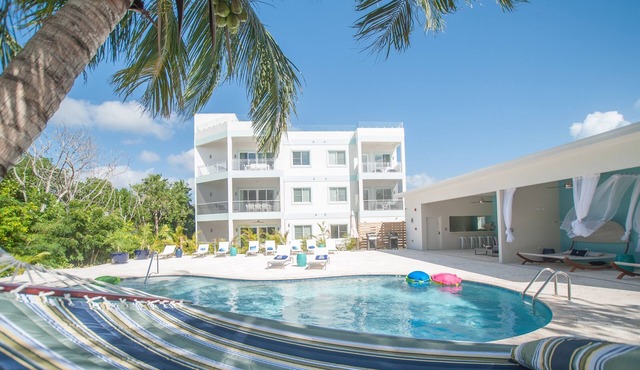 Private 7 Mile Beach Beach Club. Ocean views from Roof Terrace and Pool Pavilion in West Bay