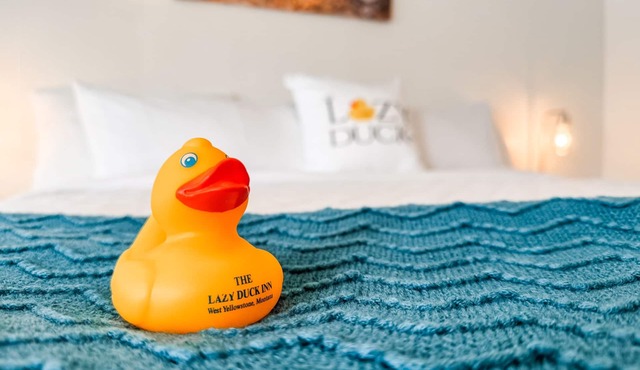 Relax in Lazy Duck Inn #27, a spacious king suite just 1 minute from Yellowstone. in West Yellowstone