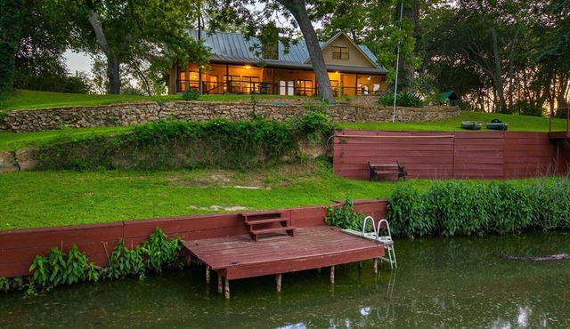 Riverfront home on Lake Seguin with dock, kayaks, beautiful views & air hockey in Seguin