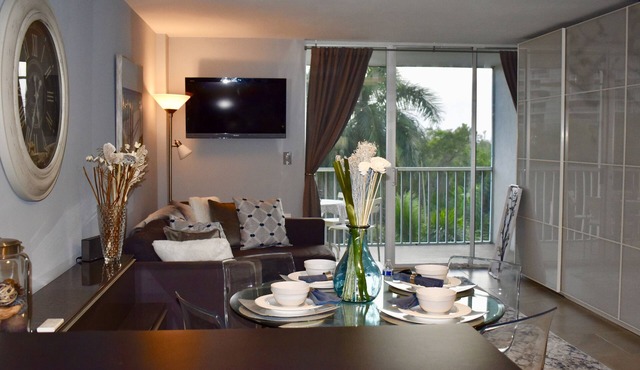 Steps from bluebill beach with stunning sunsets from your balcony. in Naples