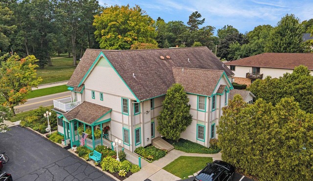 Steps to the lake & downtown South Haven. Enjoy 10 bedrooms & 10.5 bathrooms. in South Haven